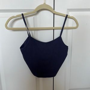 Never worn. M/L blue and black tanks. Cropped.